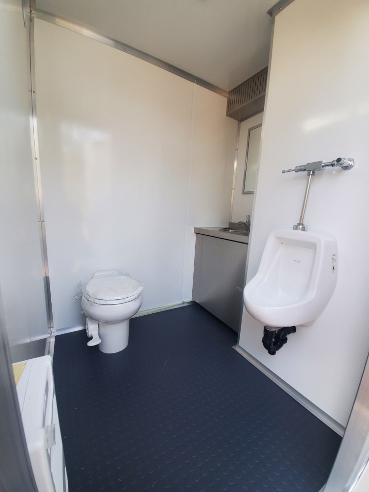 Super Single with toilet and urinal interior